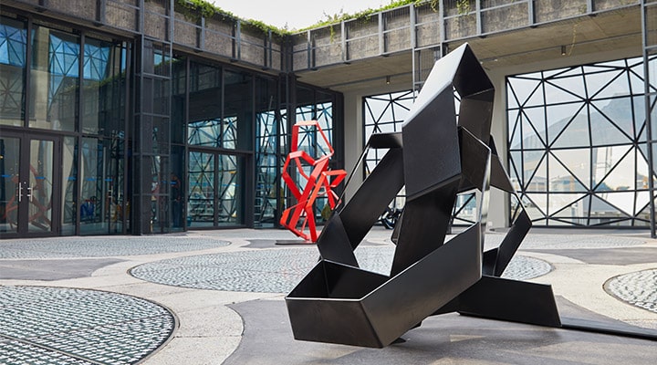 A statue in front of a building
