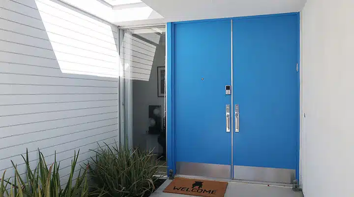 Splish-Splash-DE5844_720x400 A close up of a blue door