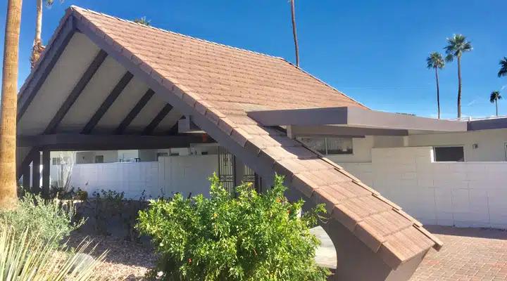 Sunrise-Lania-2 A house with bushes in front of a building