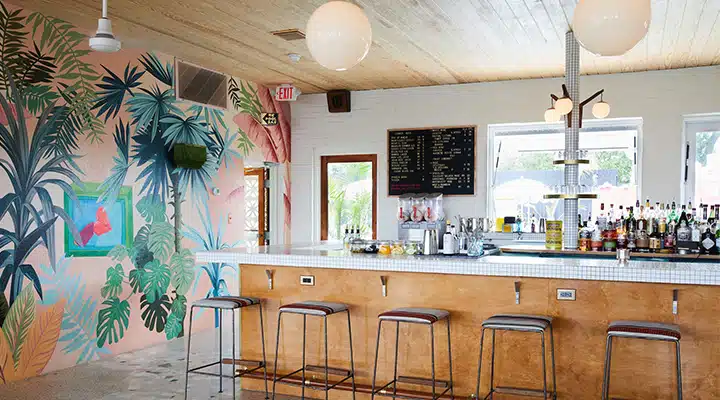 THE-DRIFTER_Lobby-Bar-02_Nicole-Franzen-for-Design-Hotels-720x400 A room filled with furniture and a large window