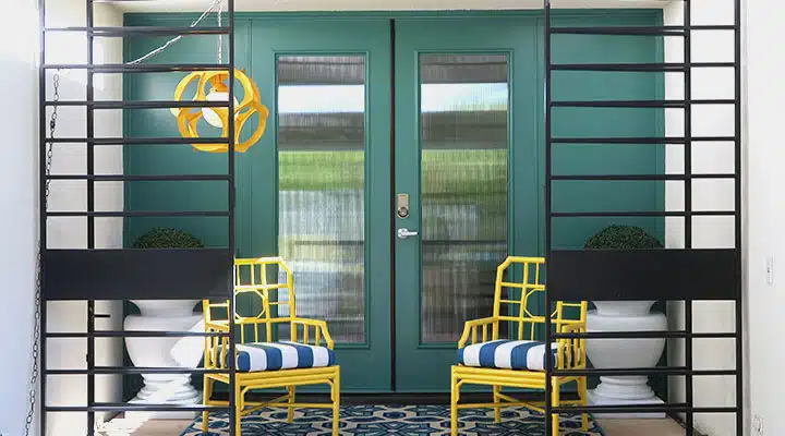 The-Green-Hour-DET544_720x400 A chair sitting in front of a window