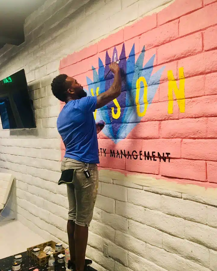 Tysen_Knight14-720x900 A man standing in front of a building