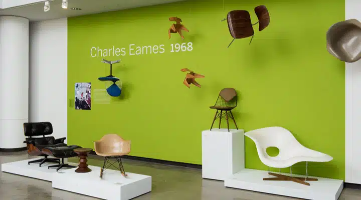 UAM_Frank_Bros_111_LOW_RES A screen shot of a living room filled with furniture and a lamp