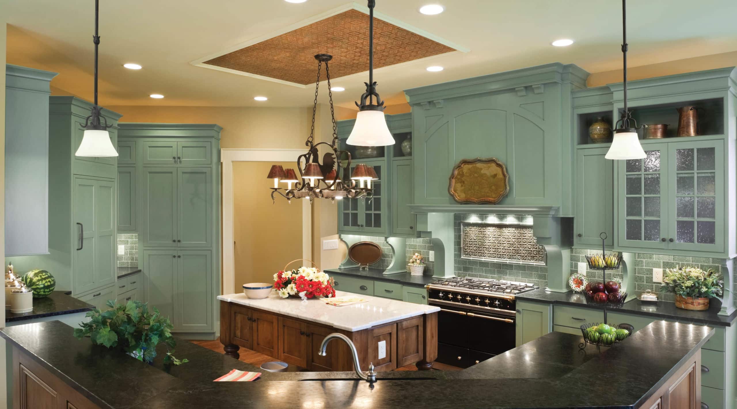 A kitchen with an island in the middle of a room