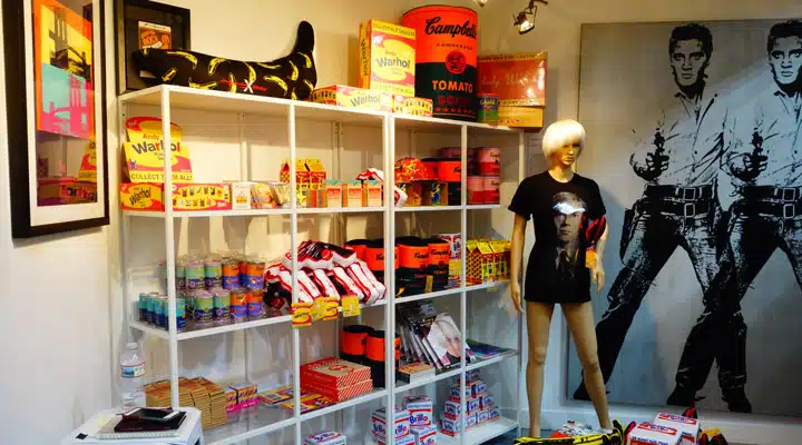 Warhol-6 A person standing in front of a refrigerator