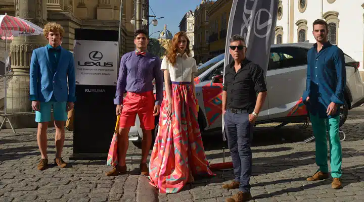 d A group of people walking down the street