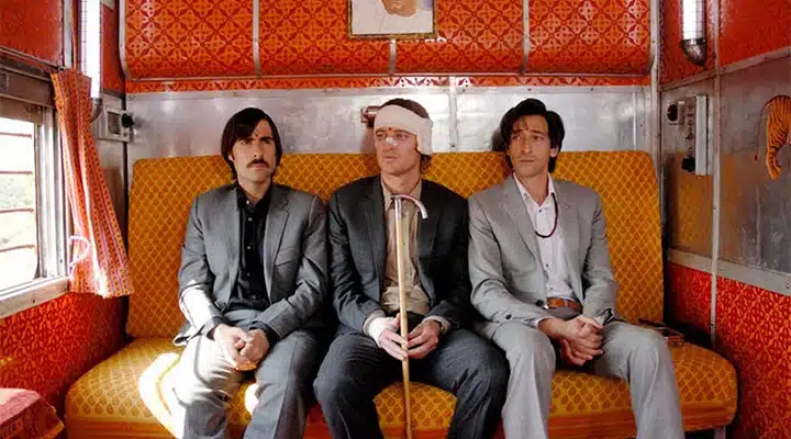 darjeerling_720x400 Adrien Brody et al. that are sitting on a couch