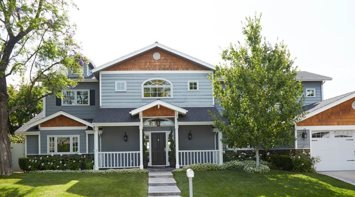 A large lawn in front of a house