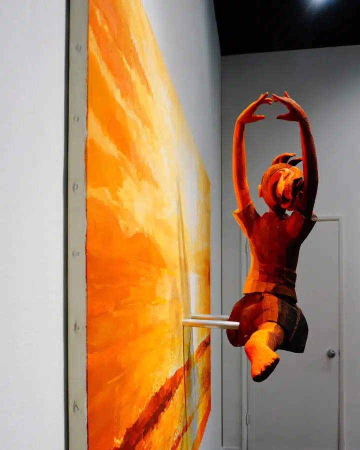 flightless_wings_2-720x900 An orange hanging from a door