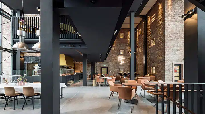 hl-3-720x400 A dining room table in front of a building