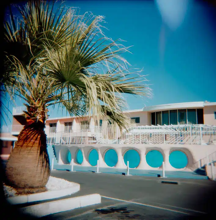 iStock-157292644-720 A palm tree in front of a building