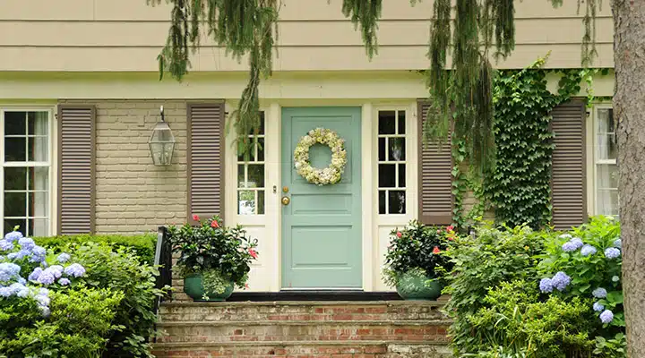 iStock-171281489-720x400 A close up of a flower garden in front of a house