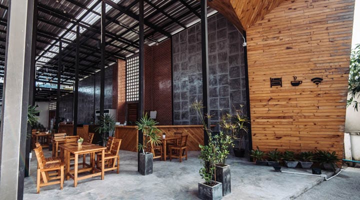 A dining room table in front of a building