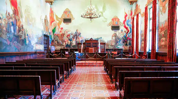 iStock_85811411_LARGE A person sitting in a chair in a room