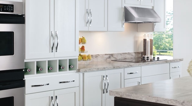 A stove top oven sitting inside of a kitchen