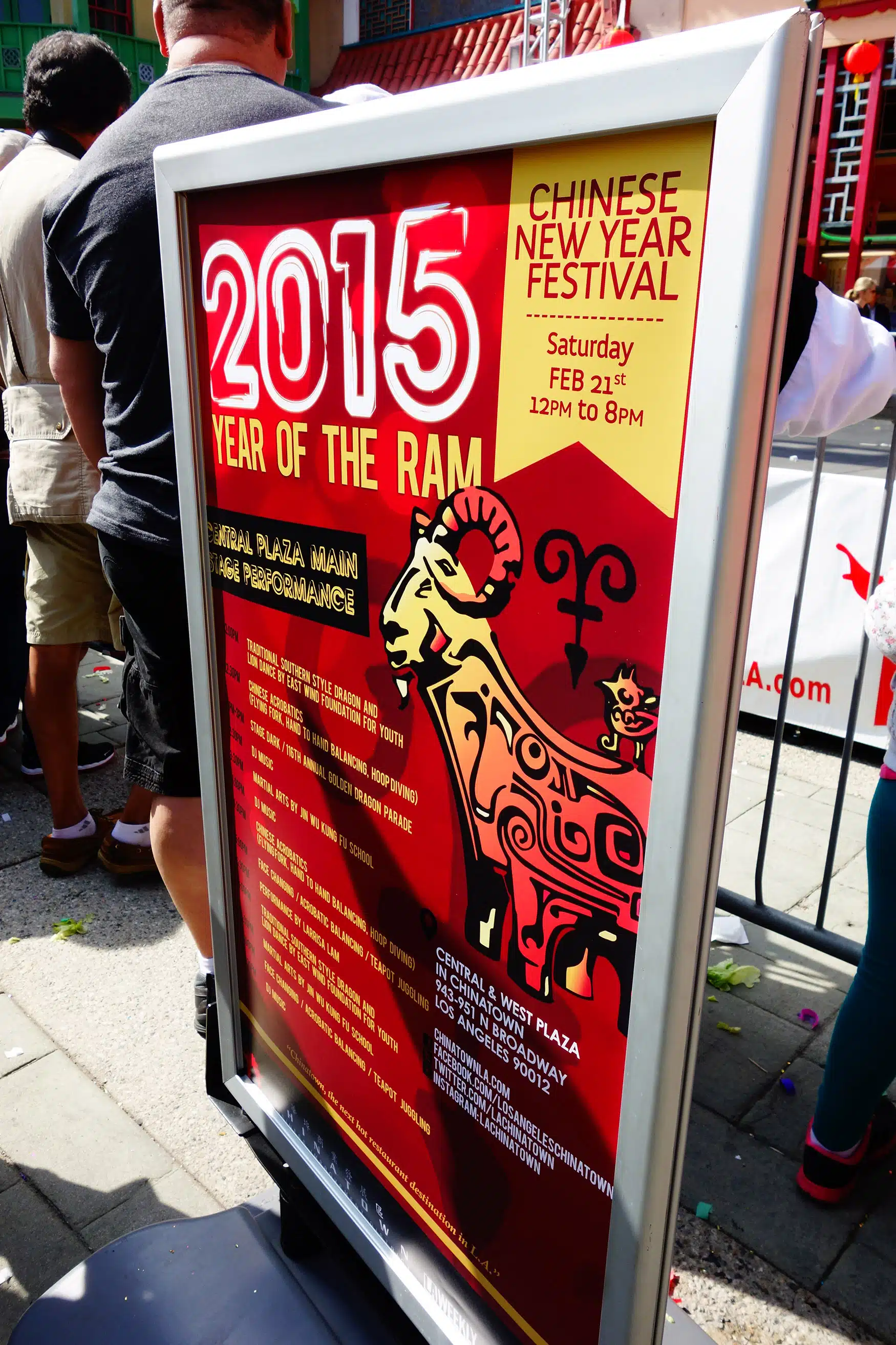 newyearsfestival1 A person standing in front of a sign