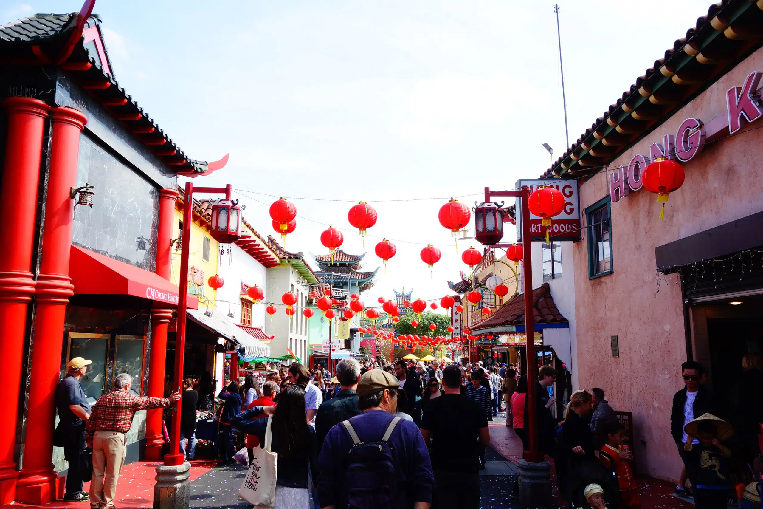 newyearsfestival3 A crowd of people walking on a city street