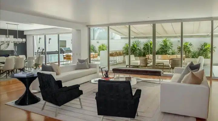 open_plan-720x400 A living room filled with furniture and a large window