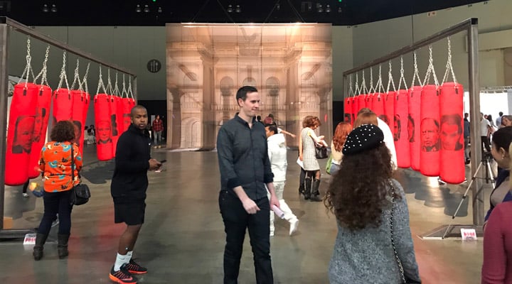 A group of people standing in front of a store