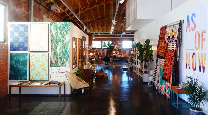 shop-1 A dining room table in front of a building