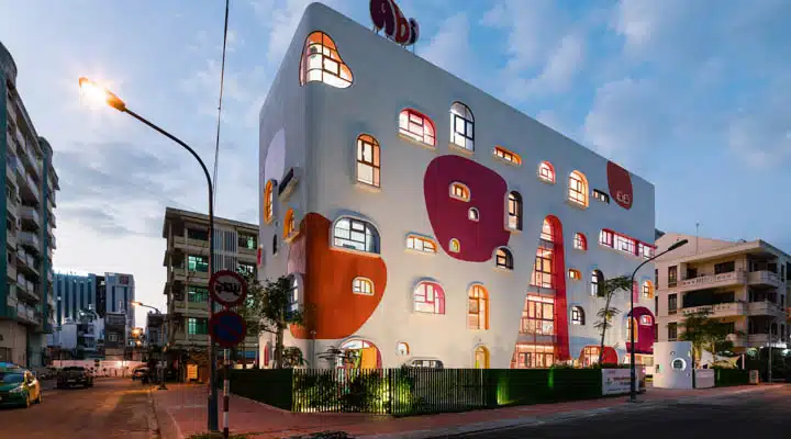 ttc-elite-saigon-kindergarten-kientruc-o-photography-quang-tran_dezeen_2364_col_24-720x400 A building that has a sign on the side of a road