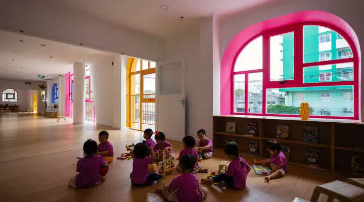 ttc-elite-saigon-kindergarten-kientruc-o-photography-quang-tran_dezeen_2364_col_34-720x400 A group of people in a room
