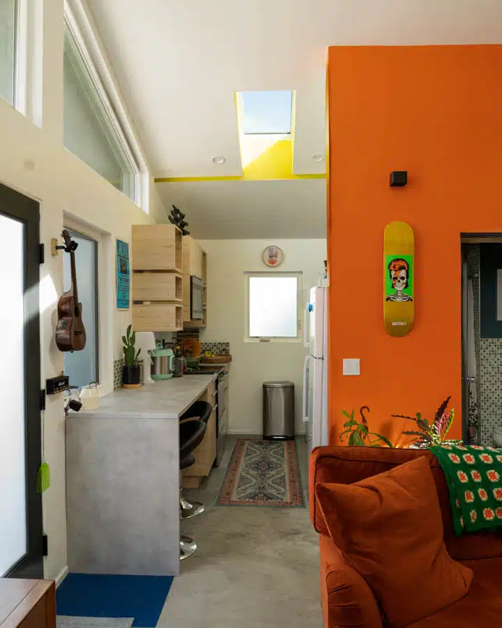 _DSC0013-720x900 A living room filled with furniture and a fire place