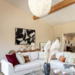 A living room filled with furniture and a flat screen tv