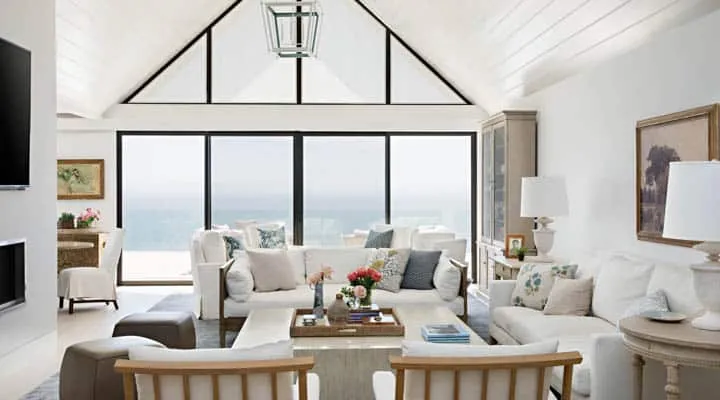 Malibu_Residence_living_room-720x400 A living room filled with furniture and a large window