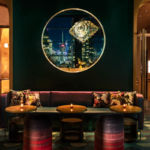 A living room filled with furniture and a large window