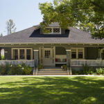 A house with trees in the background