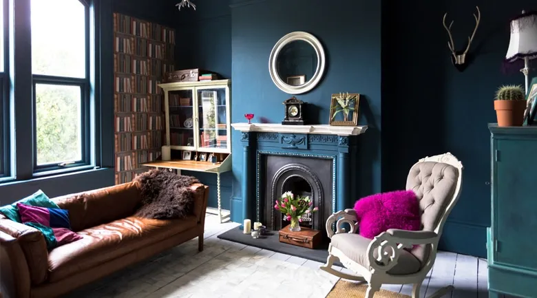 A living room filled with furniture and a fire place