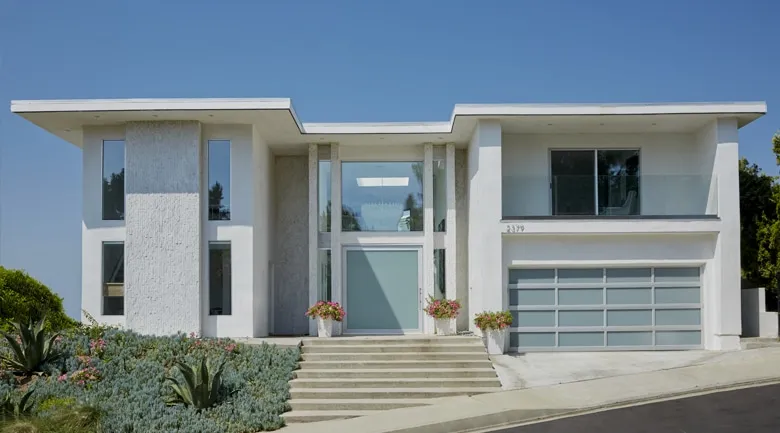 A house with trees in the background