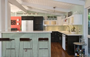 A kitchen with a large window