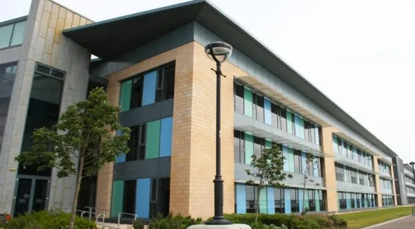 image of black brick commercial building