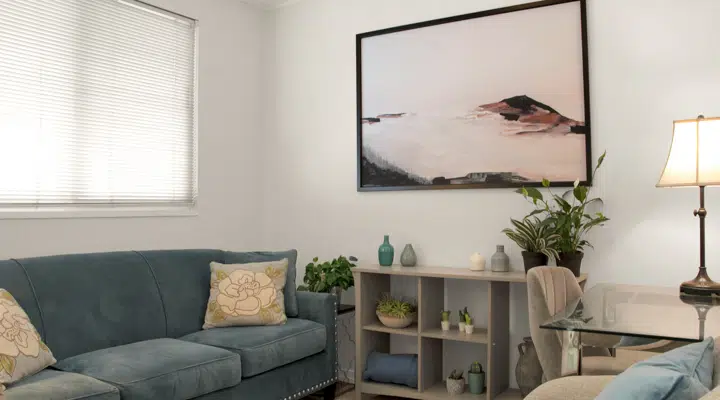 A living room filled with furniture and a flat screen tv