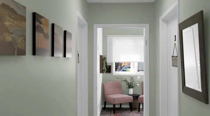 A room filled with furniture and a large window