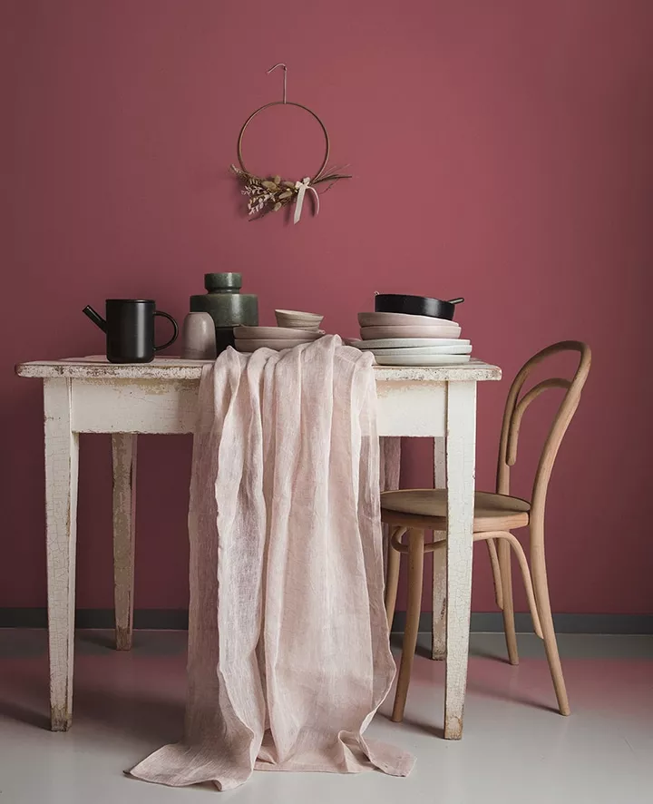 A chair sitting in front of a table