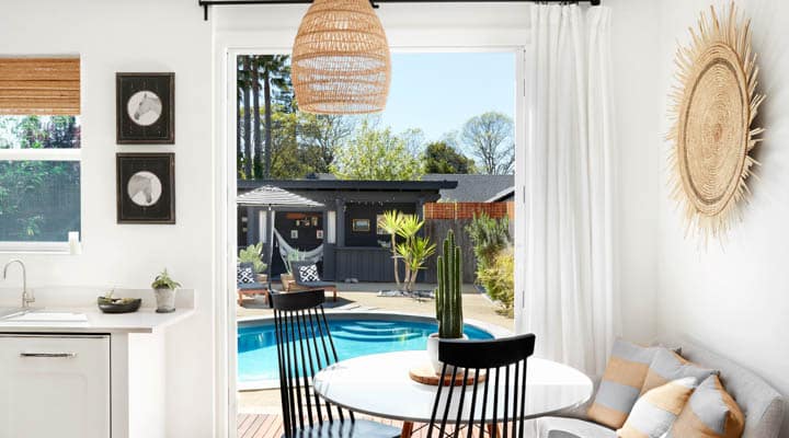 A living room filled with furniture and a large window