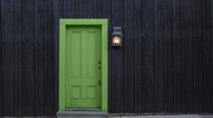 A close up of a doorway in front of a door