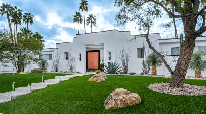 A large lawn in front of a house