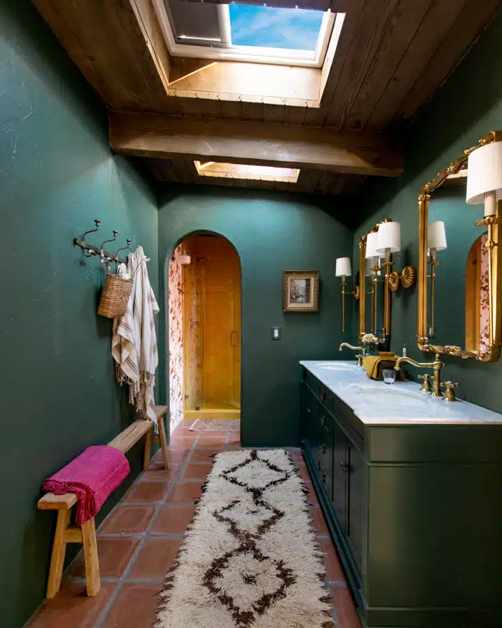 A kitchen with a sink and a fireplace