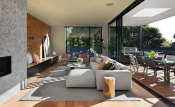 A living room filled with furniture and a large window