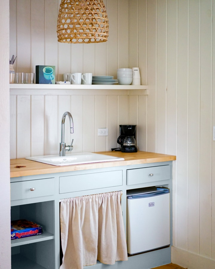 A kitchen with a stove and a sink