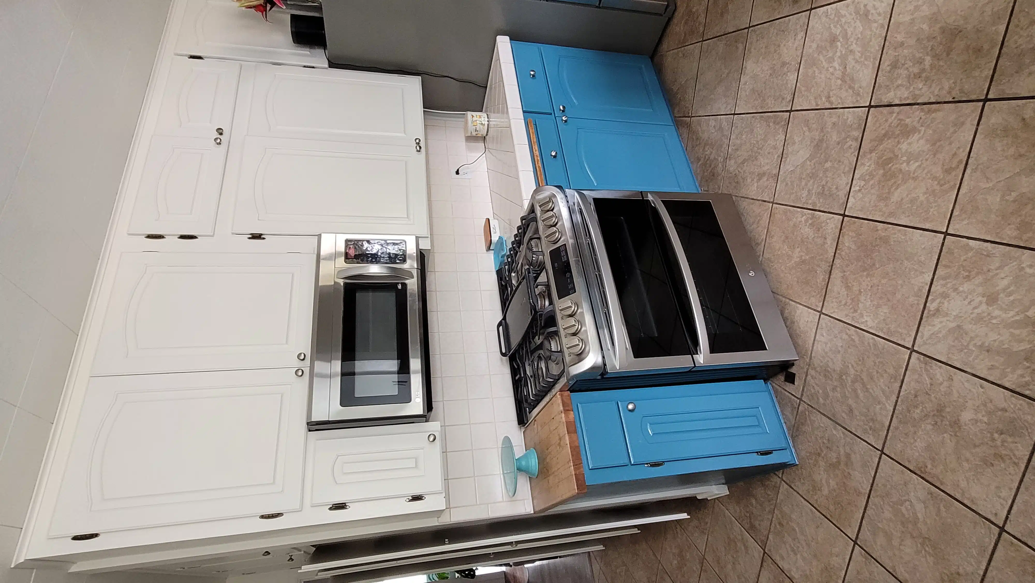 A stove top oven sitting inside of a kitchen