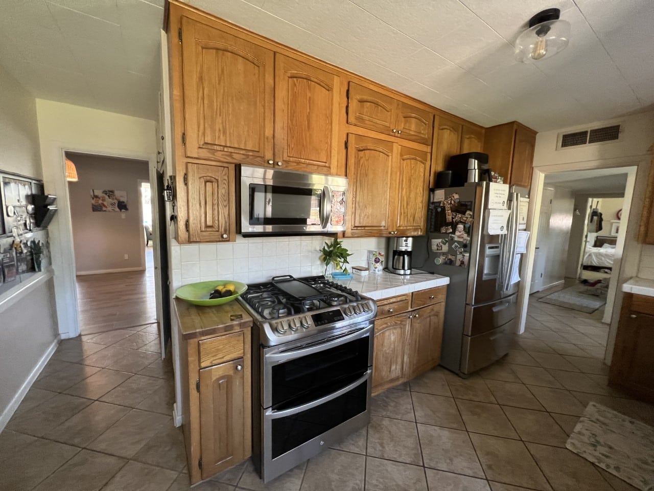 A kitchen with a tile floor
