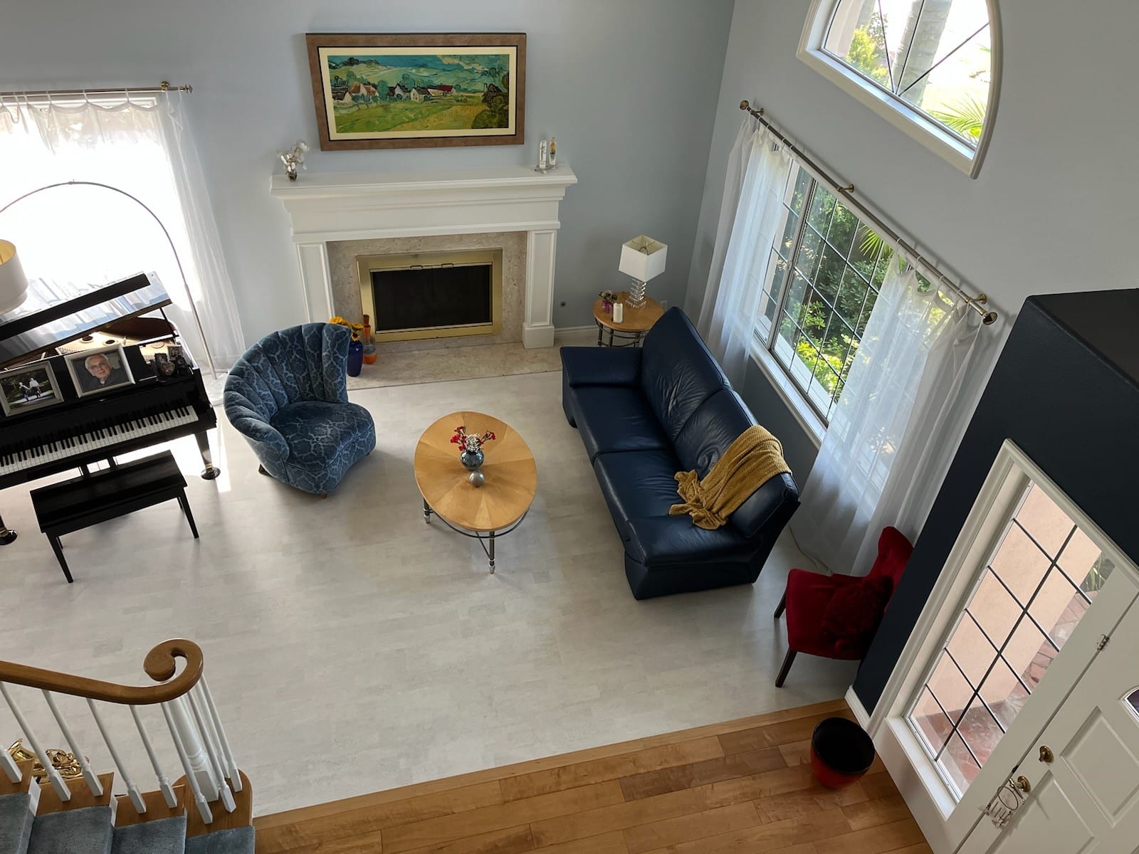 A living room filled with furniture and a fire place