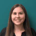 A woman smiling for the camera