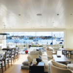 A living room filled with furniture and a large window