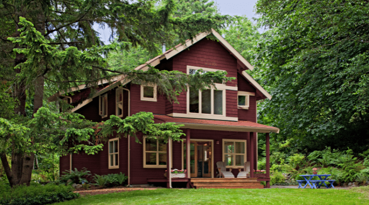 A house with trees in the background